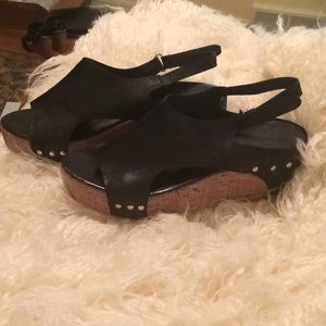 Black wedge back strap wedge shoes